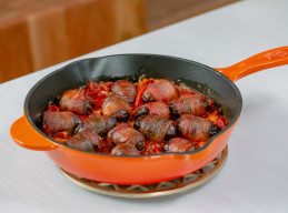 Chorizo Stuffed Dates Wrapped in Bacon in Red Pepper Sauce 