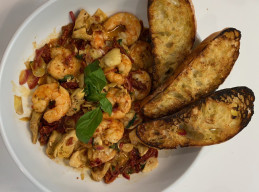 Sautéed Shrimp with Artichoke Hearts, Sun-Dried Tomatoes, Lemon and Basil 