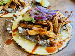 Carnitas-Style Chicken Tacos with Black Bean Puree and Pickled Red Onions
