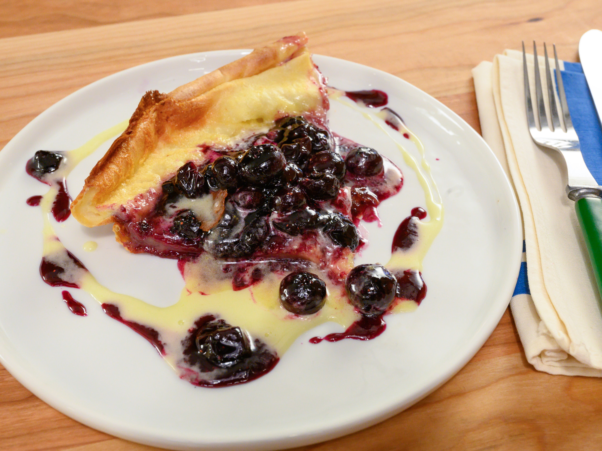 Dutch Baby With Lemon Curd And Blueberry Syrup