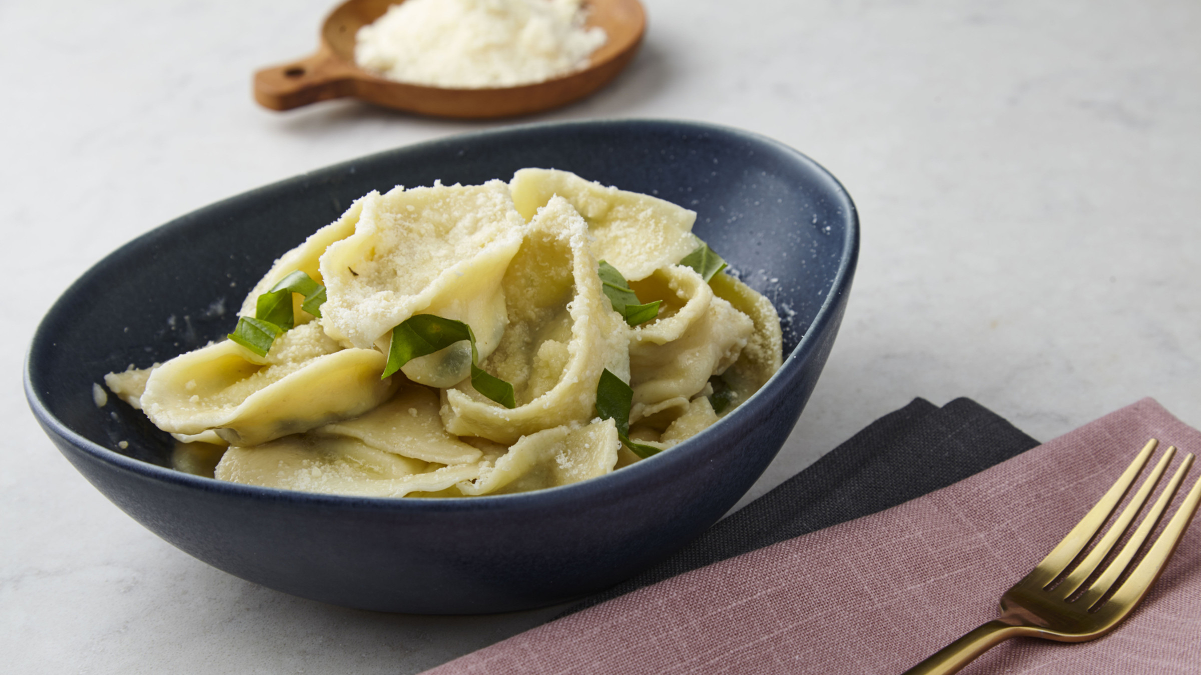 Tortellini With Spinachricotta Filling And Parmesan Sauce Food